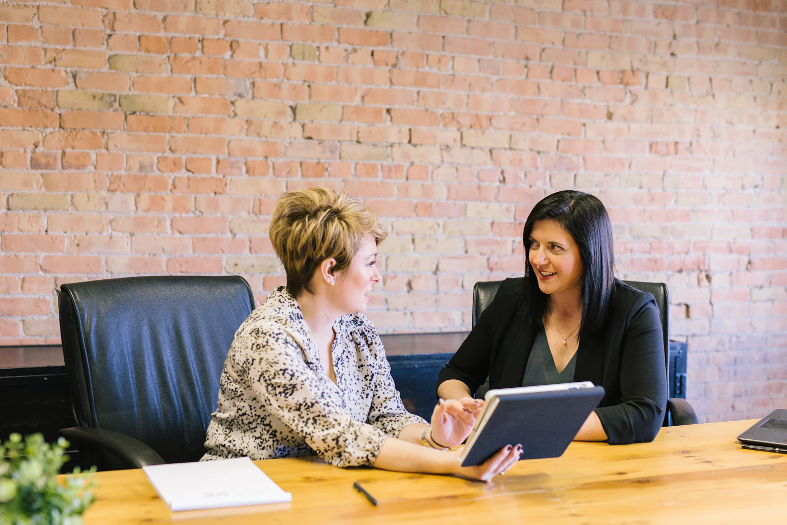 A wellness coach reviewing a plan with a client