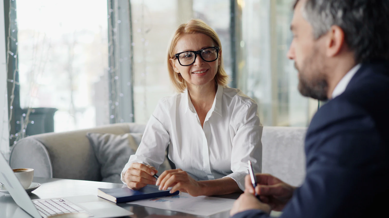 A coach in a one-to-one session with a client